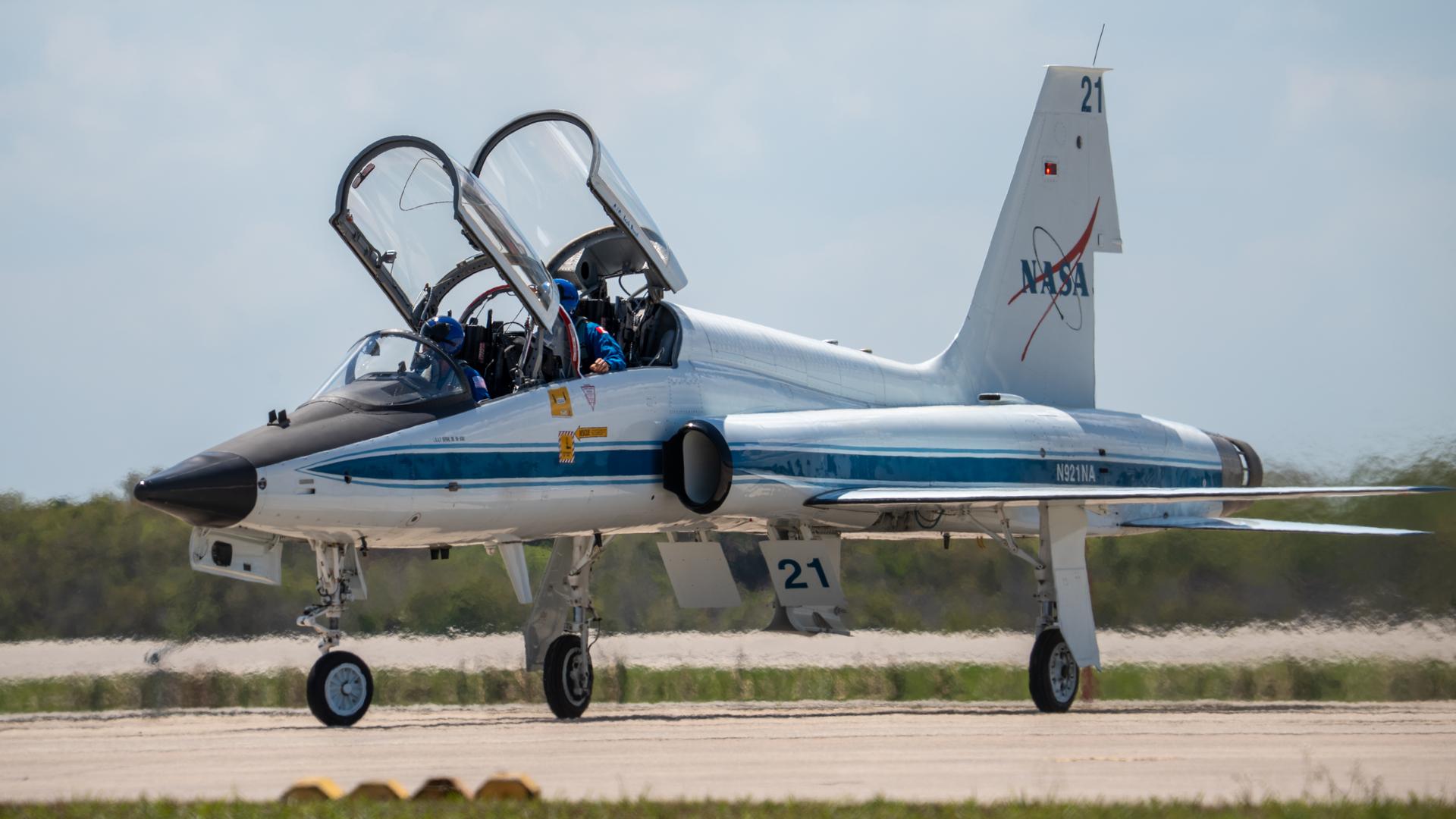 These images show the moments shortly after the arrival of the Artemis II crew to NASA’s Kennedy Space Center on March 27, 2026 ahead of the launch. The four astronauts, Victor Glover, Reid Wiseman, Christina Koch, and Jeremy Hansen, arrived on a T38, which can be seen behind them. They took turns speaking to the crowd as they also announced the zero-gravity indicator they would be taking with them on their journey.